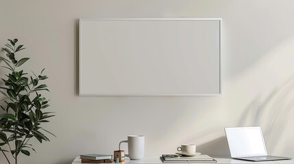 A white rectangular frame hanging above a side table in the living room with a cup, a laptop, and a few books. HD 8K mockup wallpaper Photographic Image