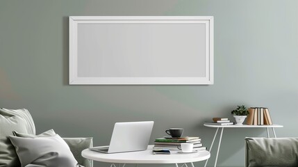 A white rectangular frame hanging above a side table in a modern living room, surrounded by a laptop, a cup,  HD 8K mockup wallpaper Photographic Image