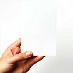 Obraz premium Male hand holding two blank sheets of paper (tickets, flyers, invitations, coupons, money, etc.), isolated on white background