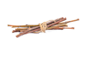 Dry branches, twigs isolated on white background, branch tied together, bundle of firewood, pieces of collected small dry tree branches or twigs, isolated in white background, different angle view
