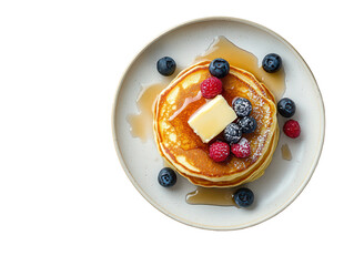 Isolated Pancakes with Berries and Maple Syrup
