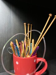 Crochet hooks and knitting needles handmade craft objects set collection photo 
