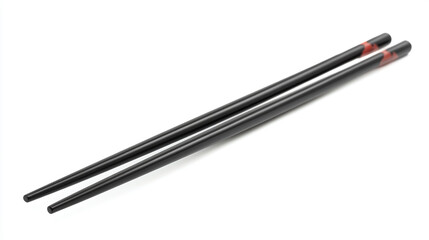 Black chopsticks holding sushi isolated on white background.