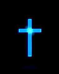 Obraz premium Glowing Cross on a Black Background