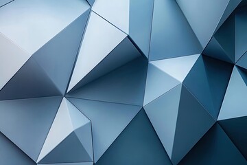 Obraz premium Abstract geometric pattern of overlapping triangles in shades of blue and gray. A 3D design with a modern, futuristic aesthetic