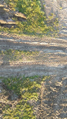 Challenging driving conditions on wet dirt road