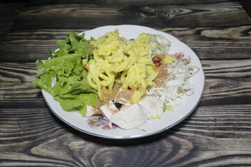 Asinan Jakarta is a specialty of Betawi, Jakarta Indonesia, made from marinated raw vegetables, doused with peanut sauce, and sprinkled with peanuts and crackers.