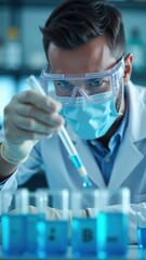 Laboratory technician using pipette for scientific research. Medical or pharmaceutical laboratory with test tubes and protective gear.