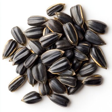 Close-up of delicious sunflower black seeds, isolated on white background