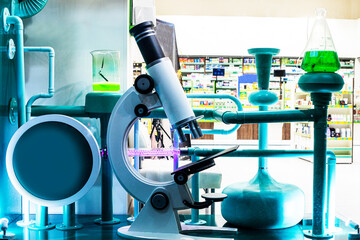microscope with flasks and pharmaceuticals. Health care