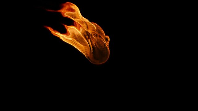 Sphere of fire in the air. Close-up of flashes. A fiery figure.