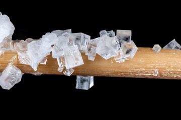 salt crystals on a wooden stick