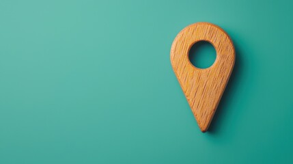 Closeup of a simple wooden navigation pointer icon on a vibrant turquoise background conveying the concept of travel direction and location tracking