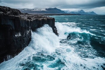 Stormy ocean waves crashing against rugged cliffs
