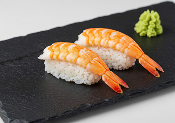 Two Shrimp Nigiri Sushi on Black Slate Plate