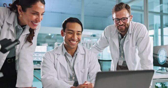 People, scientist and high five for success in lab for good news, medical research and vaccine results. Teamwork, microscope and laptop for project report, healthcare feedback and celebrate promotion