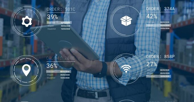 Using tablet with digital order tracking, warehouse worker managing inventory