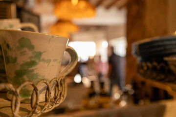 Cozy Ceramic Cup in a Warm Café Ambience