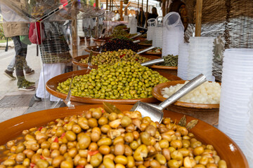 Variety of Olives at a Traditional Market Stall