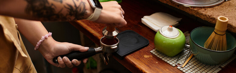 Delightful young woman crafting coffee at a cozy cafe on a sunny afternoon