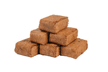 Stack of compressed wood briquettes isolated on white background, used as an eco-friendly fuel source for stoves, fireplaces, and heating systems..