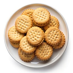 A plate of delicious golden brown sandwich cookies with creamy filling