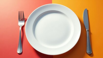 Empty plate with fork and knife, signifying abstinence , nutrition, intermittent fasting