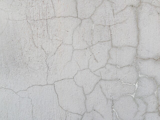 Abstract cracked grey concrete wall texture background