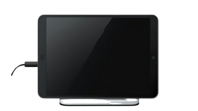 Charged Tablet Ready for Use: A sleek black tablet rests on a docking station, charging, highlighting modern technology and digital connectivity.