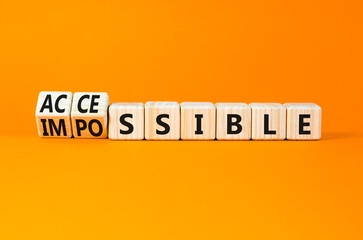 Accessible or impossible symbol. Concept words Accessible or Impossible on beautiful wooden blocks....