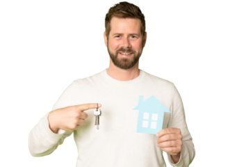 Young smiling man holding a key and a model house isolated on transparent background. PNG transparent.
