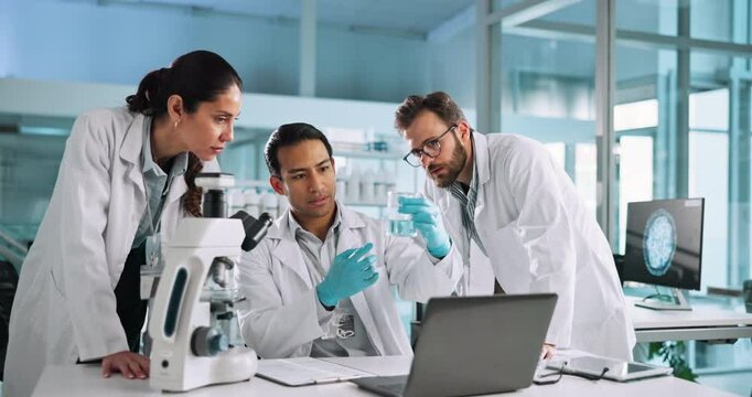 Scientist, laptop and people with beaker in lab for pharmaceutical study, chemical trial and cure development. Science, teamwork and liquid sample for medical research, drug innovation and experiment