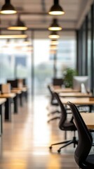 Blurred office background of a modern interior with desks and chairs, professional workspace, corporate environment, contemporary office design