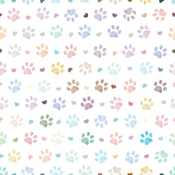 Fototapeta Colorful pastel paw prints seamless pattern