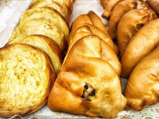 Freshly baked pastries displayed at a local bakery in the late morning