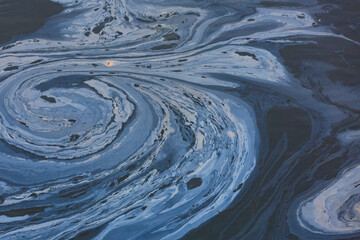 The view from above of a layer of oil, a slick on the waters of Puget Sound.