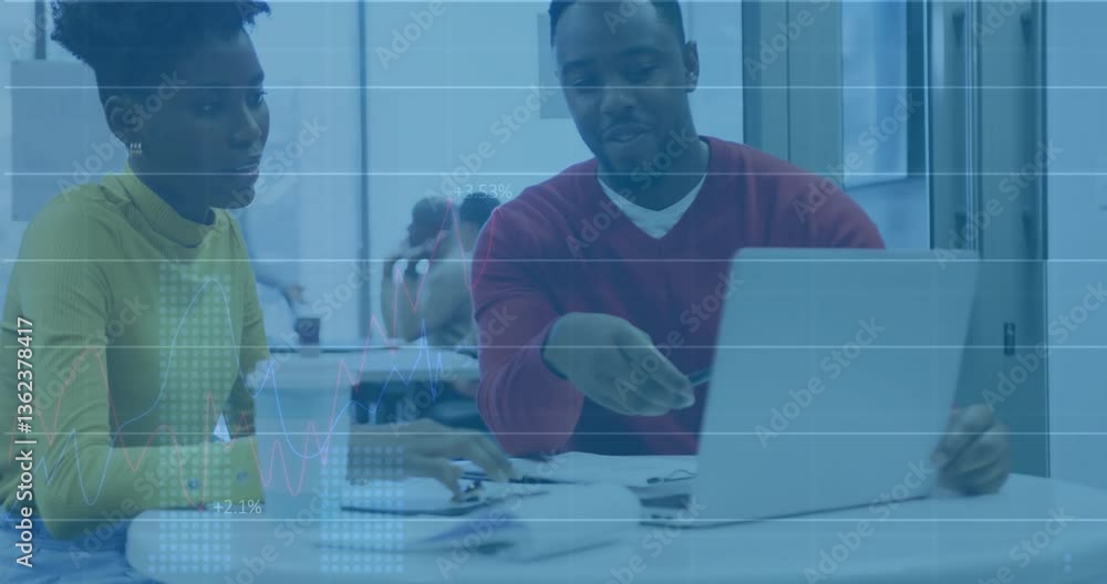 Aufkleber analyzing financial graphs, business colleagues discussing data in office setting