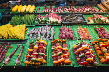 assortment of traditional Vietnamese street food on the counter at the Asian Night Market in Vietnam in Asia in Da Nang
