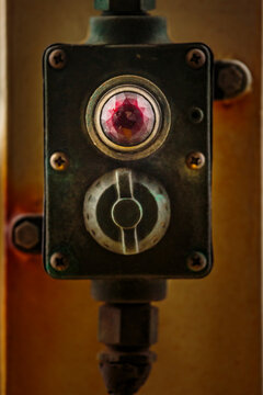 Controller, a light and a movable dial on a metal box