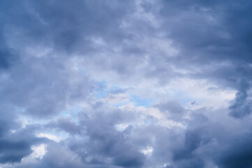 Obraz premium Twilight, sunset sky, clouds in the evening at dusk with blue light.