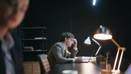 Night worker frustrated fail business talking colleague coworking office closeup