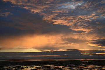 sunrise with clouds on the beach