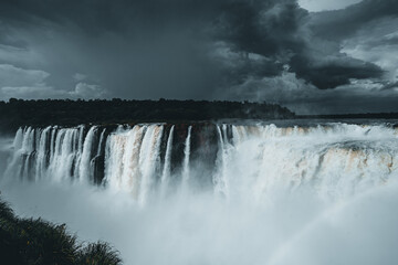 Iguazu falls before the storm (with rainbow)