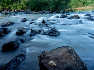 River of Time: Rocks and Flowing Water