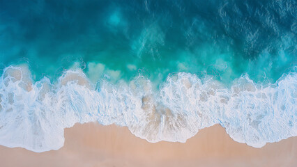 Fototapeta premium Aerial Beach View, Turquoise Waves Meet Sandy Shoreline.