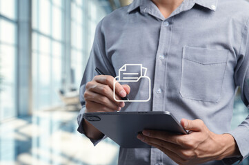 Businessman Checking Document on Tablet in Modern Office Space