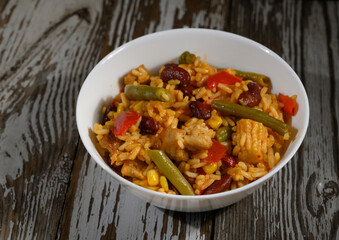 Delicious and colorful rice dish served in a bowl, highlighting vibrant ingredients and comforting flavors for a satisfying meal
