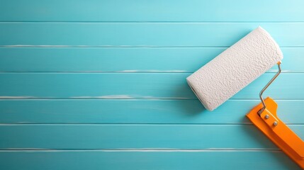 Obraz premium Painting renovation process home interior of paint roller bright blue background top-down view diy concept