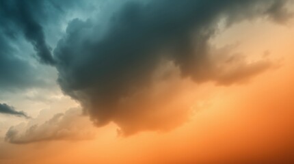 Obraz premium Dramatic Sky with Storm Clouds and Warm Sunset Colors Shining Through