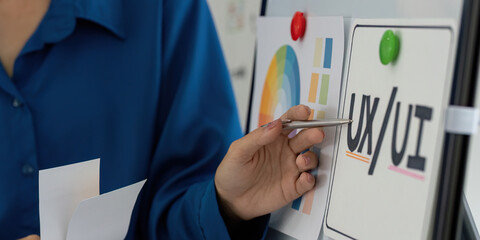 UX UI Design and Collaboration. Team members brainstorming ideas for a digital product, focusing on...